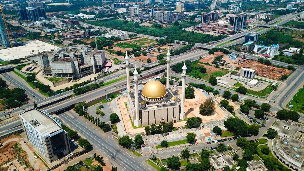Abuja from the air, the National Mosque and the central business district.